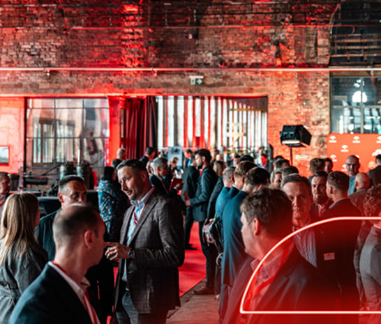 ORLEN Supplier Forum participants talking in the event space.
